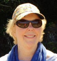 Photo of writer Sally Petersen, client of editor Lisa Dale Norton, wearing sunglasses and a cap.